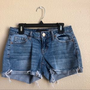 mid rise distressed shorts